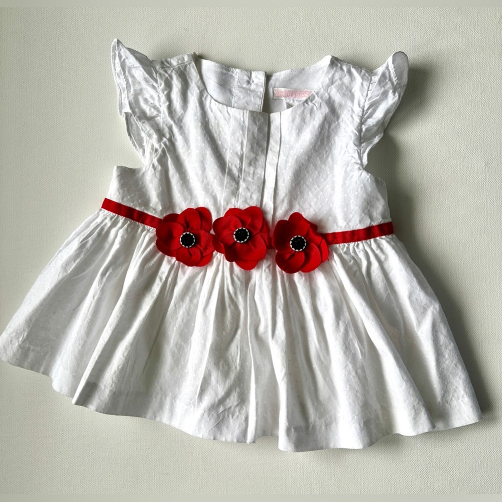 Janie and Jack girl’s white blouse with red flowers.  Size 18-24M.
